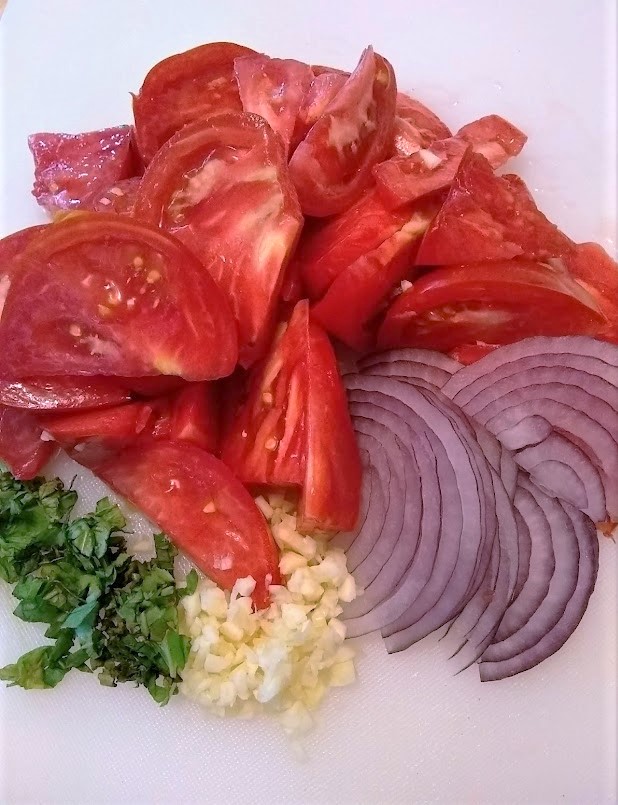 tomato salad ingredients chopped tomato onion garlic and basil