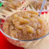 clear bowl of homemade applesauce on the table