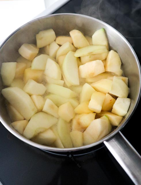 3 varieties of apples chopped in a saucepan