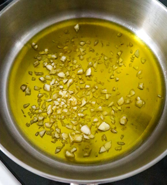 olive oil and garlic in a skillet