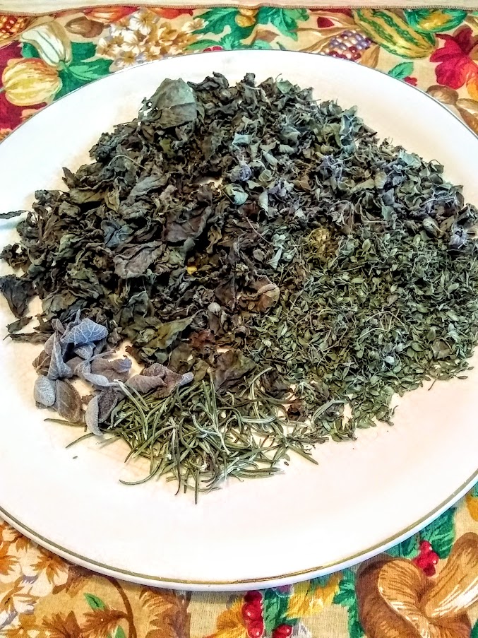 a plate full of dried herbs to make italian herb mix