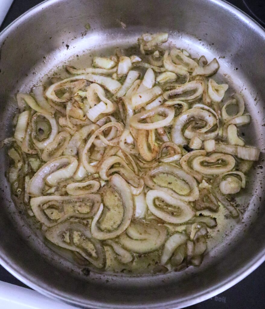 sliced onions browned in butter in skillet for pork chops apples and onions