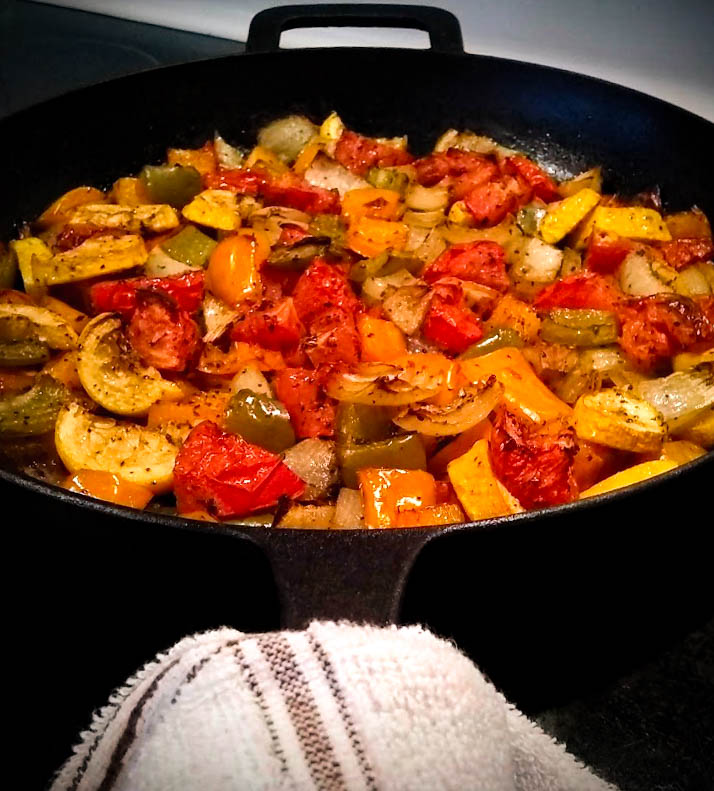 vegetables are done and out of the oven in a cast iron skillet 