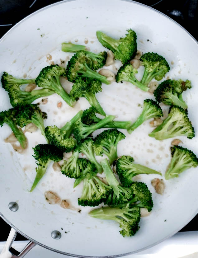 broccoli and garlic sautéing in sesame oil 