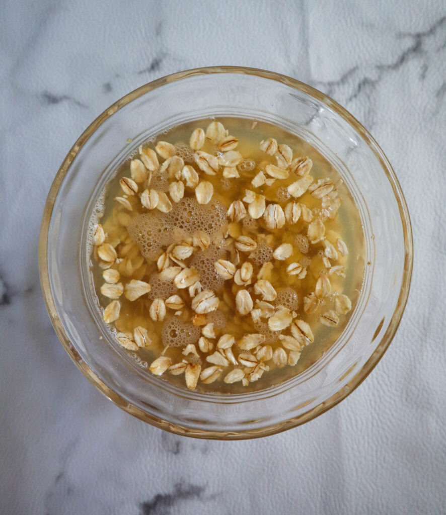 oatmeal soaking in chicken broth