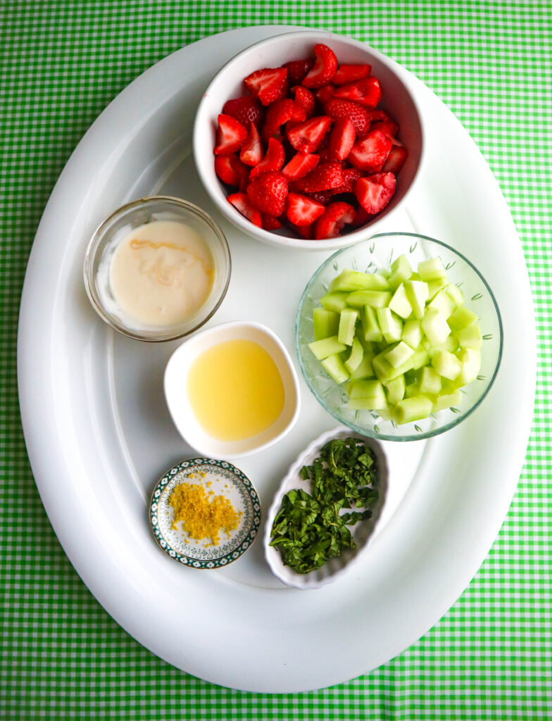 strawberry salad ingredients cut strawberries cucumber lemon juice mint basil lemon zest yogurt and honey