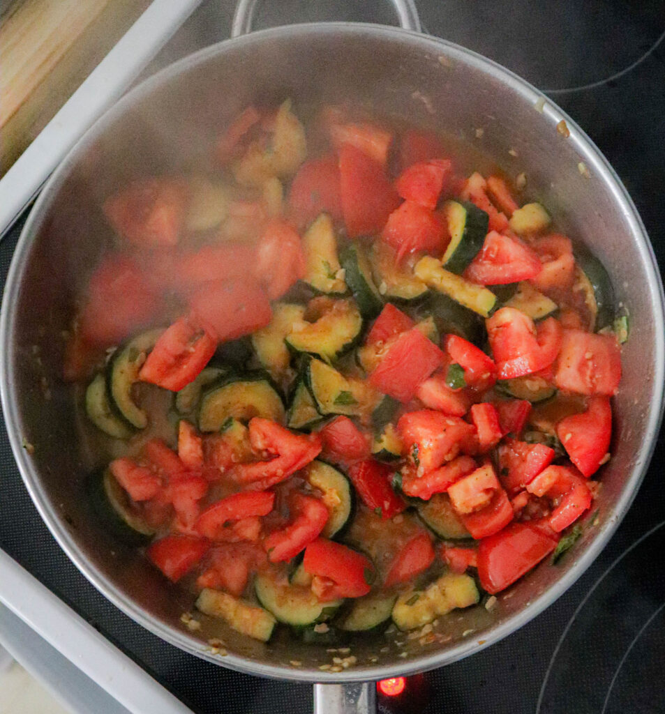 zucchini and tomato sauce steaming