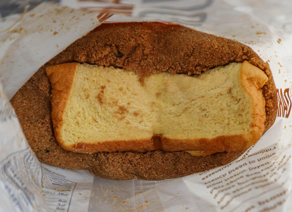 bag of brown sugar with a piece of bread on top so it doesn't harden