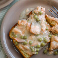 creamed salmon and peas on toast served