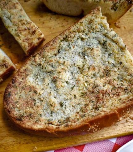 garlic bread on a cutting board