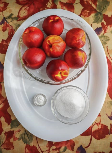 filling ingredients a bowl of yellow nectarines sugar and cornstarch